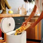 food being dumped into mill bin